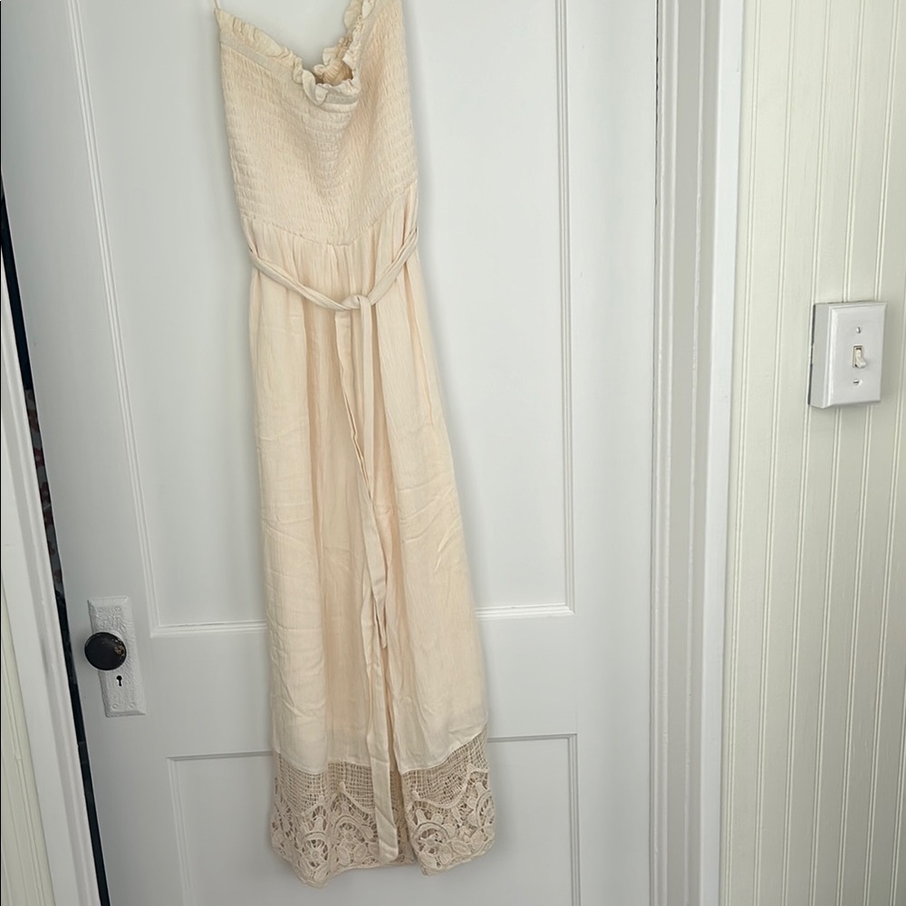 Cream jumpsuit with crochet detail